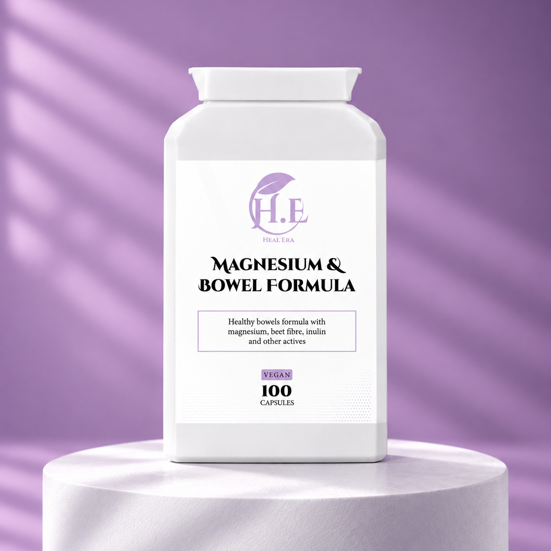 A white bottle of H.E Wellness Magnesium & Bowel Formula stands centered on a white pedestal against a lavender-purple background with soft diagonal shadow patterns.