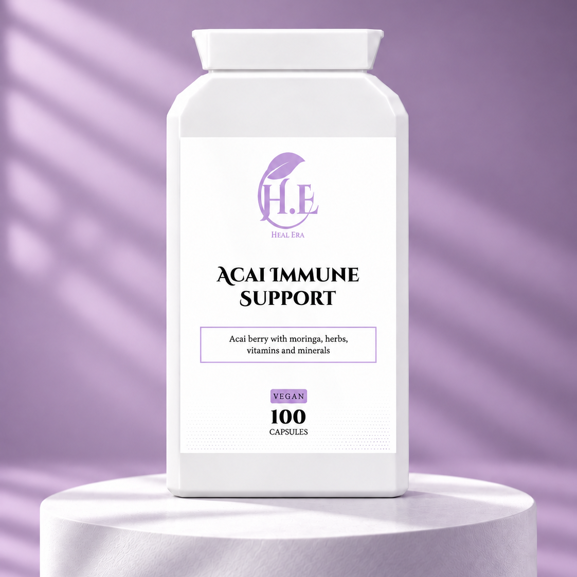 A white bottle of H.E Home Spa Acai Immune Support capsules, displayed on a matching white pedestal against a lavender-purple background with soft diagonal shadows.