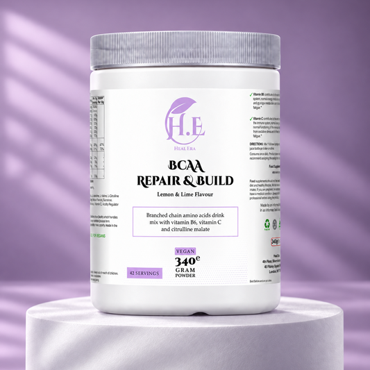 A white tub of H.E Nutrition BCAA Repair & Build powder with a purple logo and label accents, displayed on a white pedestal against a purple background.