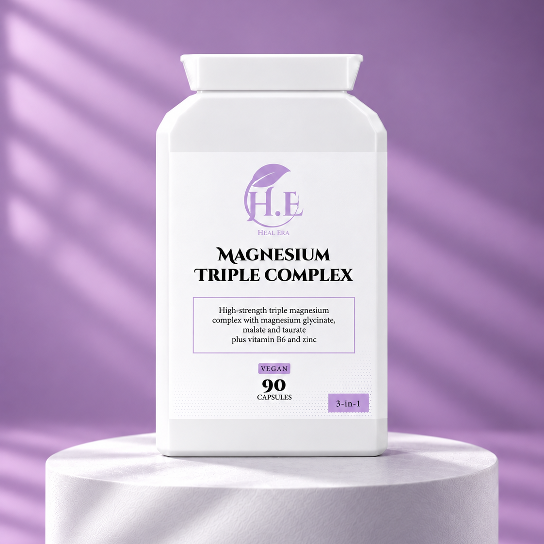 A white bottle of H.E Magnesium Triple Complex supplement capsules displayed on a white pedestal against a purple background with soft shadow patterns.