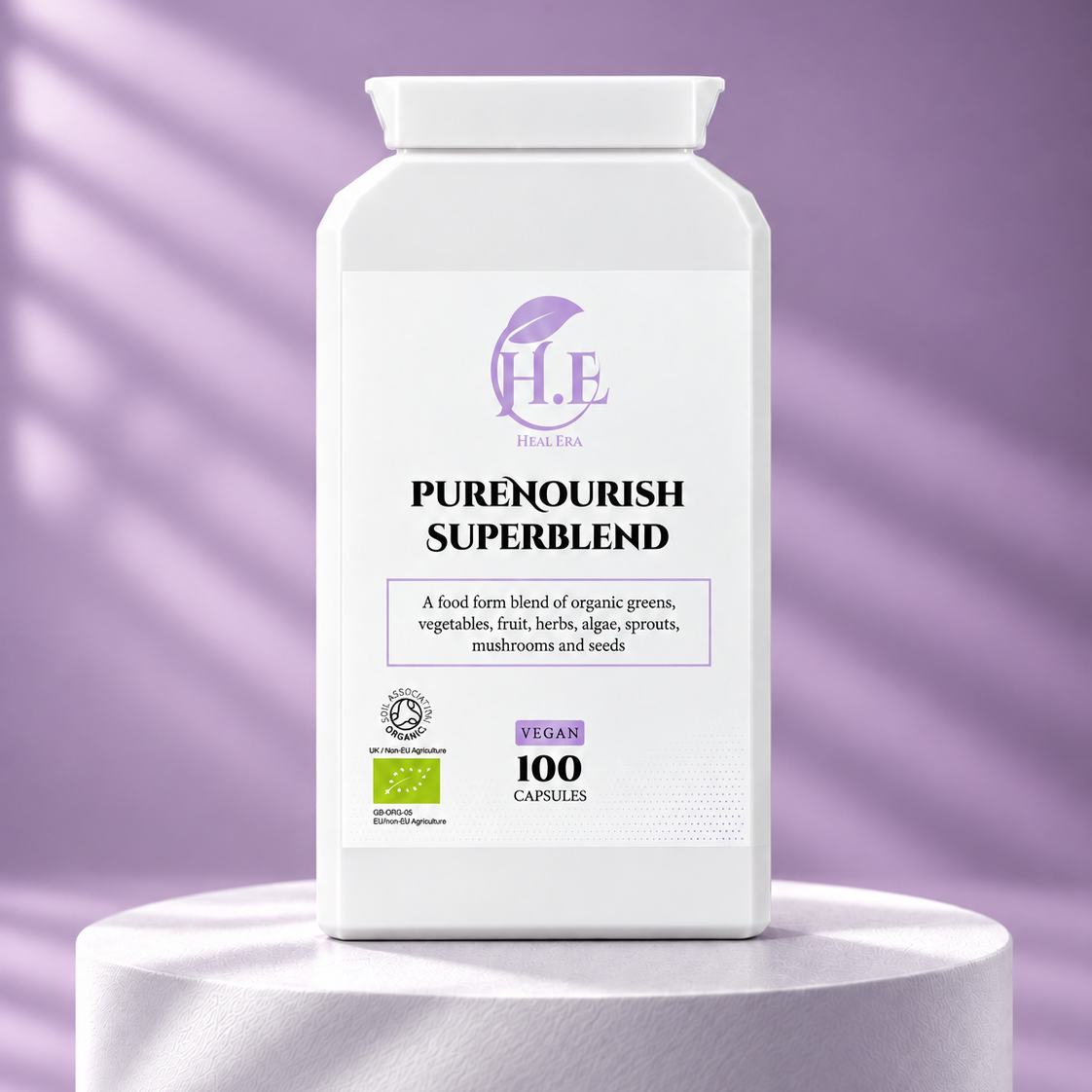 A white bottle of H.E Herbs Ltd PureNourish Superblend vegan capsules, displayed on a white cylindrical pedestal against a lavender-purple background with soft diagonal shadows.
