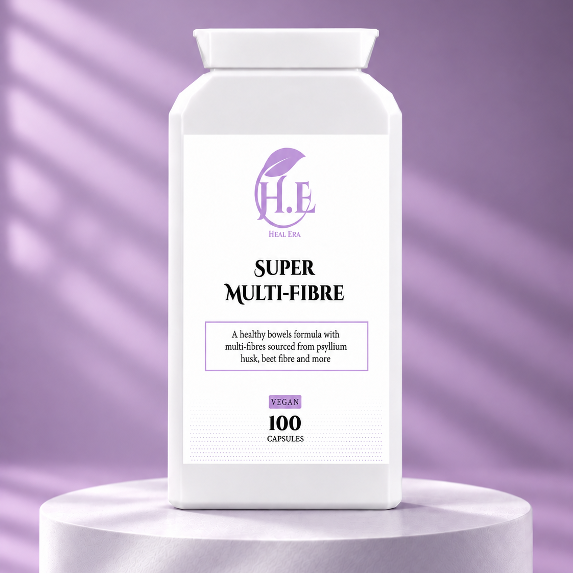 A white bottle of H.E Real Tea Super Multi-Fibre capsules displayed on a matching white cylindrical pedestal against a purple background with soft diagonal shadows.