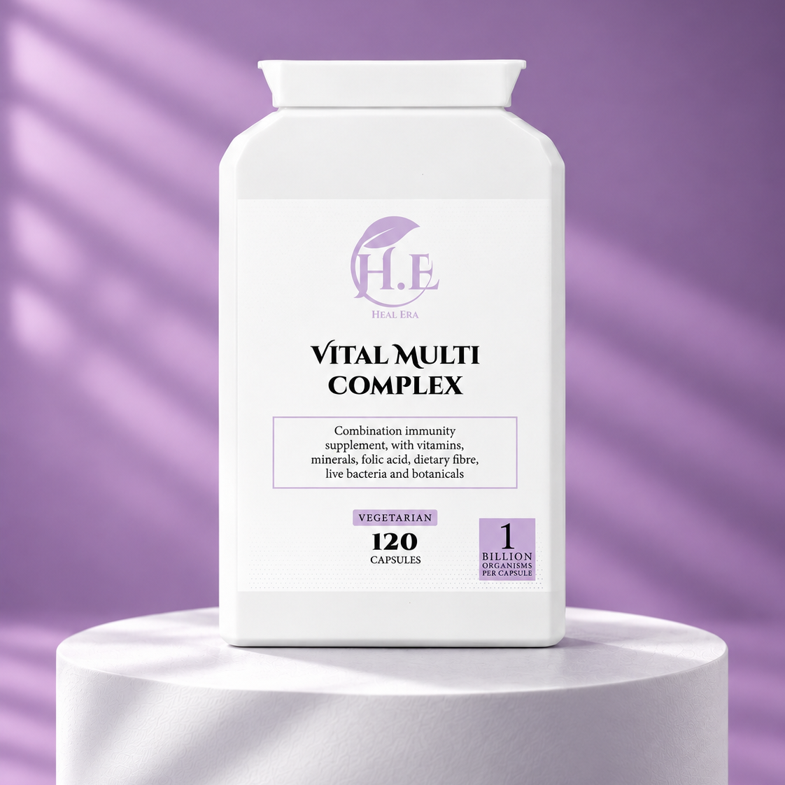 A white bottle of H.E Vital Multi Complex dietary supplement displayed on a white pedestal against a purple background with soft shadow overlays.