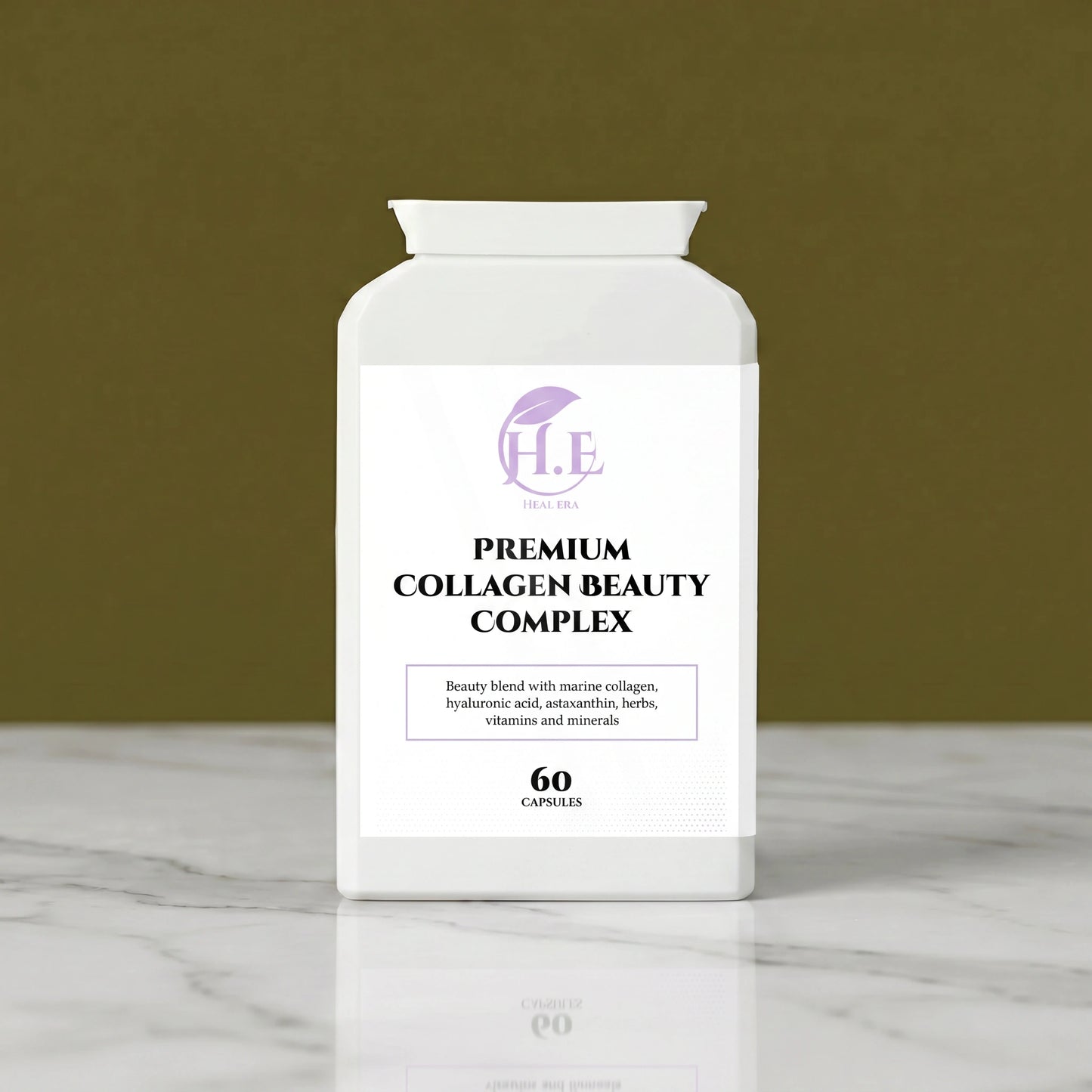 A white bottle of H.E Premium Collagen Beauty Complex capsules, set on a white marble surface against a solid olive green background.
