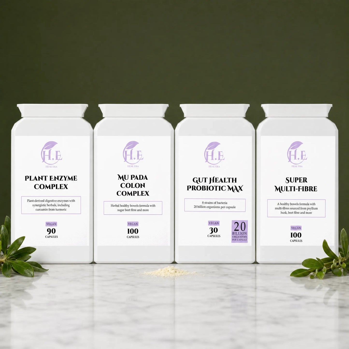 Four white supplement bottles arranged in a row on a marble surface against a dark olive background. The bottles are labeled H.E
